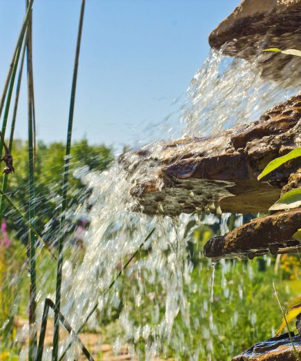 Little cascade in a garden background or texture close up